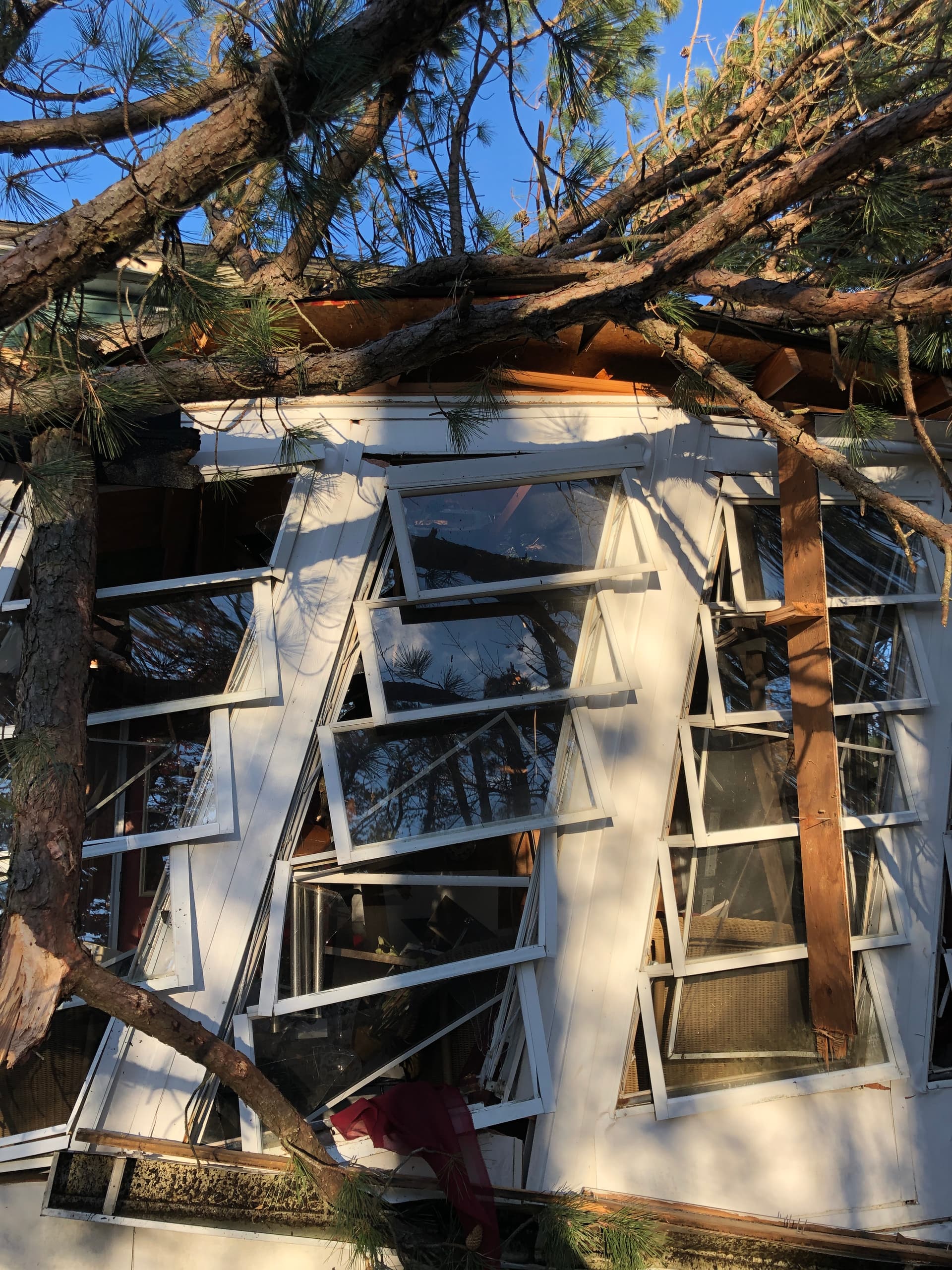 Storm-damaged flooring throughout the home.